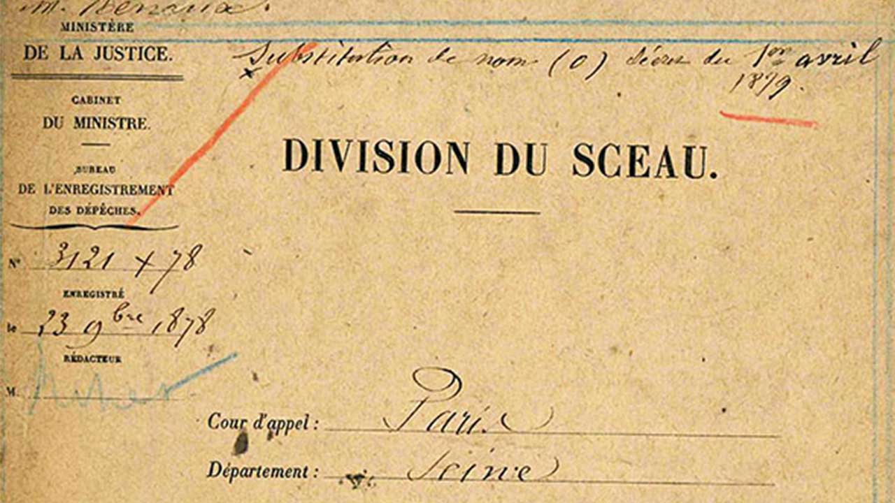 Le papier du document a en-tête du ministère de la Justice est jauni. En tête du document, il est typographié "division du Sceau".