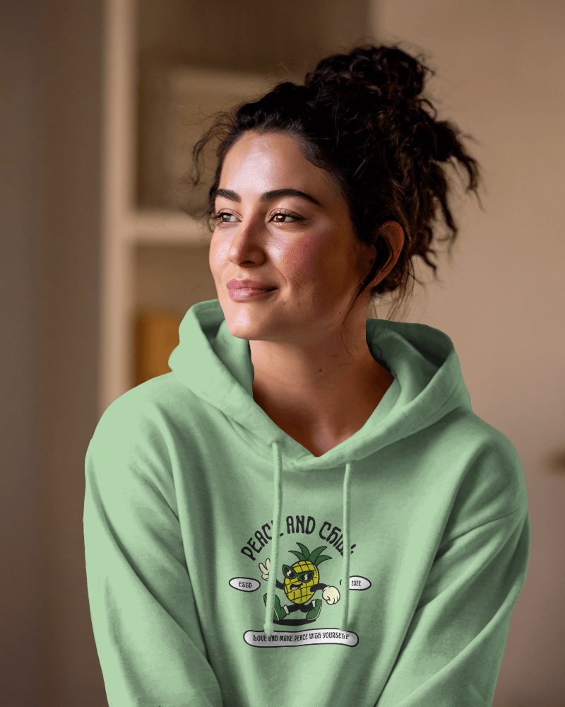 Cropped Streetwear Hoodie Mockup Female Model Posing With Hand On Hip City Backdrop Trendy And Chic Vibe