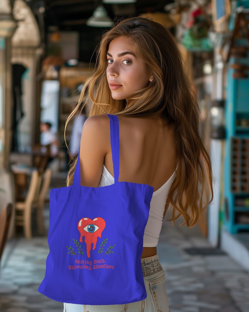 Model Looking Back While Holding Tote Bag Mockup