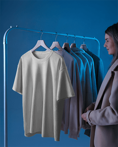 Retail Display T Shirt Mockup Hanging On Rack With Stylish Wardrobe Blue Lighting And Modern Shopping Atmosphere 575