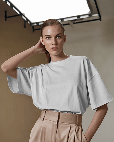 Studio Fashion T Shirt Mockup Female Model In Minimalist Setting With Neutral Tones Modern And Stylish Ambience 576