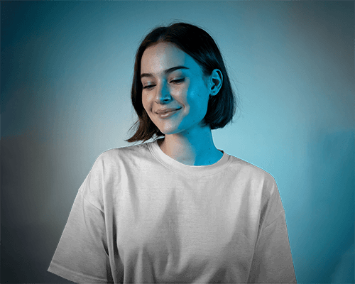 Moody Studio T Shirt Mockup Female Model In Blue Toned Lighting Modern And Artistic Visual Presentation 581