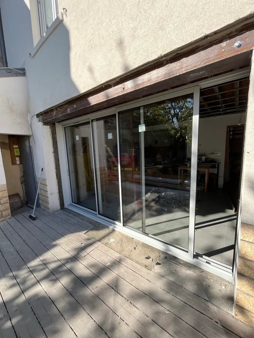 pose en Reno d’une baie vitrée 3 vantaux