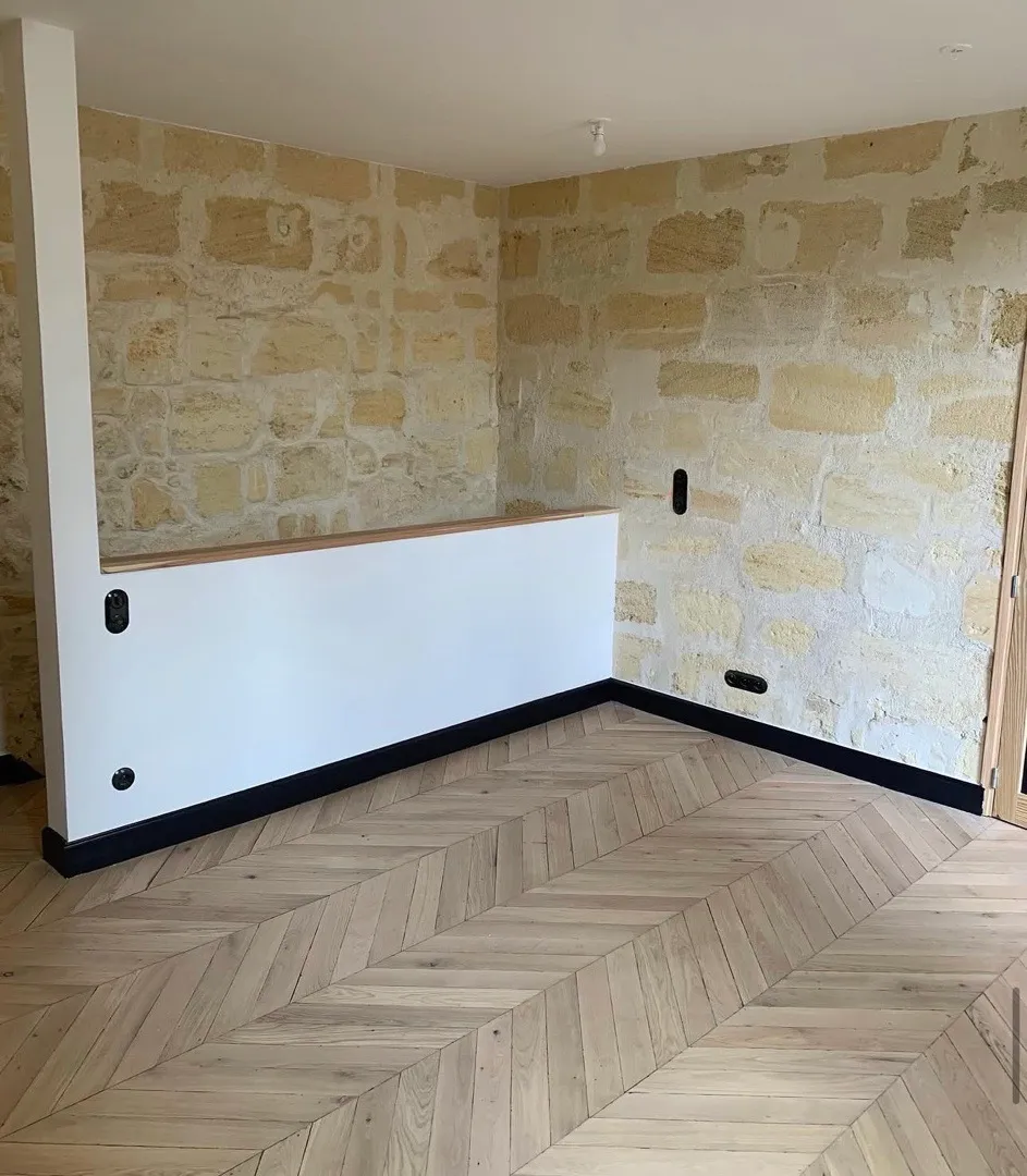 pose de plancher à coller en point de Hongrie