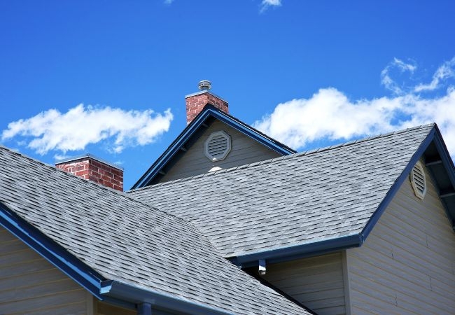 Is site clean-up performed after roof painting completion?