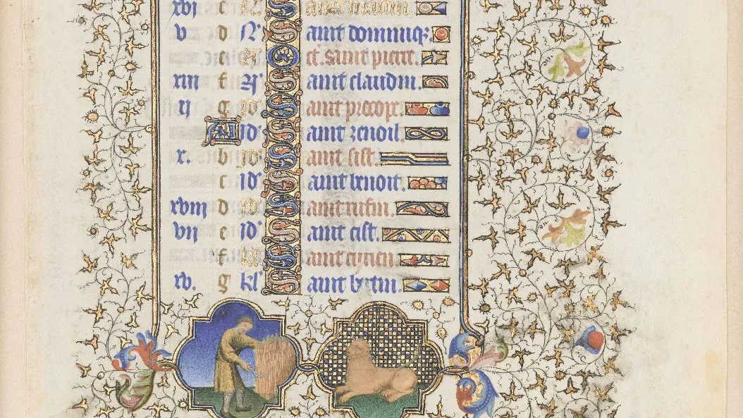Page enluminée d'un livre : calendrier liturgique avec bordures végétales, médaillons figuratifs et inscriptions gothiques. Vue de face.