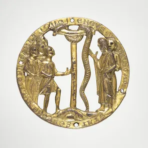 Openwork metal medallion depicting a serpent between figures. Front view.