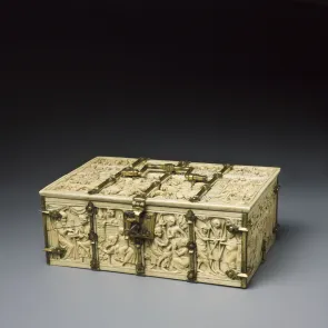 Carved ivory casket depicting scenes of tournaments and courtly love. Three-quarter view.