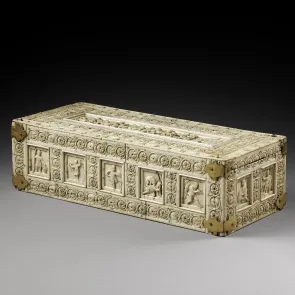 Carved ivory casket depicting scenes from Greco-Roman mythology and warfare. Three-quarter view.