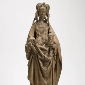 Wooden sculpture: a standing woman with long interwoven braids, holding a pot. Front view.