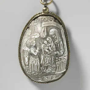 Pendant made from an engraved shell depicting a historical scene. Front view.