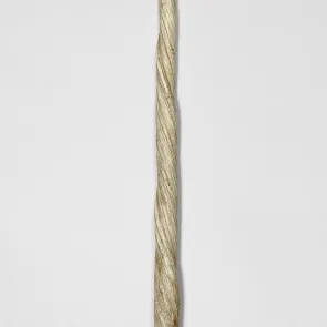 Twisted ivory object with an elongated and pointed shape. Front view.