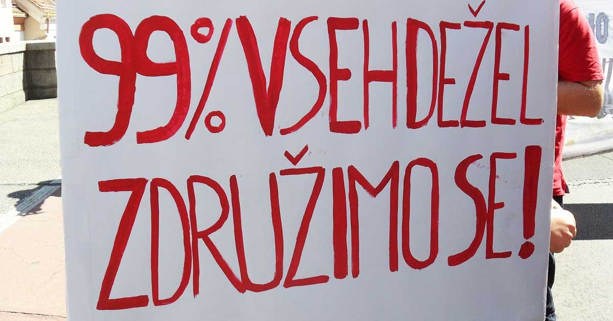 Protestni plakat, na katerem piše: