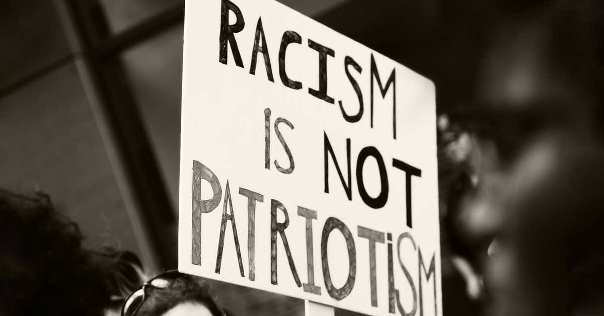 Protestni plakat, na katerem piše: