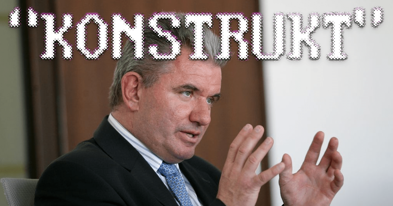 na sliki je minister Vizjak, čez njega pa je z velikimi tiskanimi črkami napisana beseda KONSTRUKT