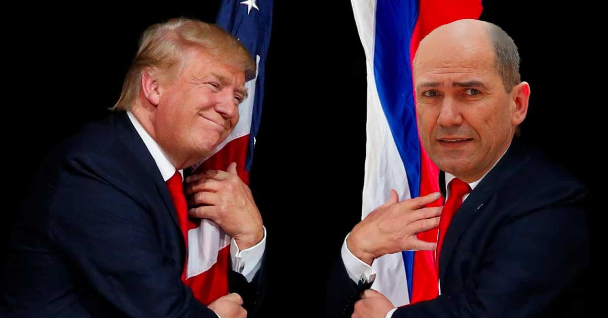 Trump in Janša, ki objemata vsak svojo zastavo.