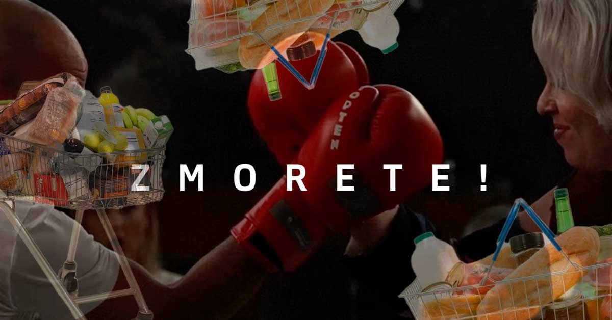 Boksarski dvoboj Zavca in Klakočar Zupančič z napisom ZMORETE!, okoli pa sta košarici s hrano in voziček s hrano.