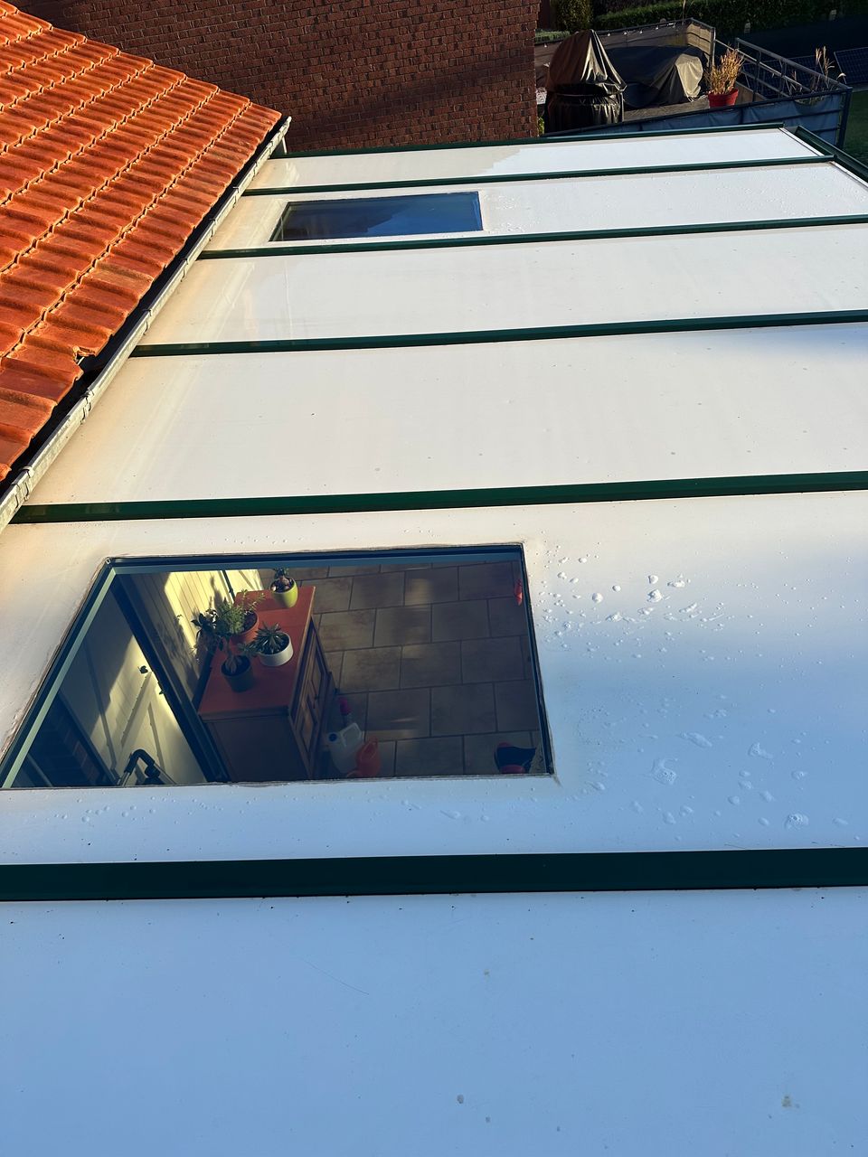 Velux toiture de véranda nettoyés