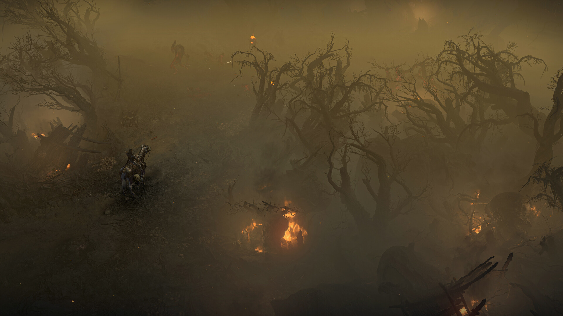 Un héros solitaire progresse dans une forêt brumeuse de Sanctuaire dans Diablo IV