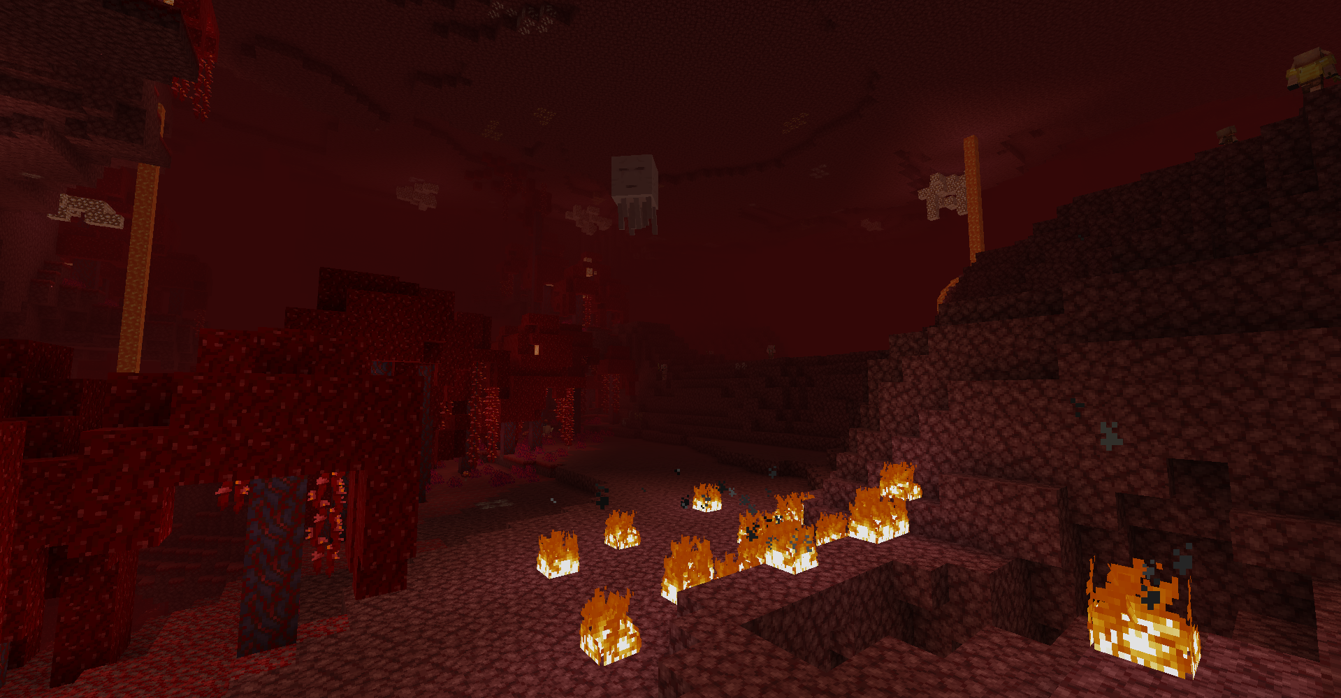 Paysage du Nether : reliefs de Netherrack rouge, foyers de feu au sol et Ghasts en vol