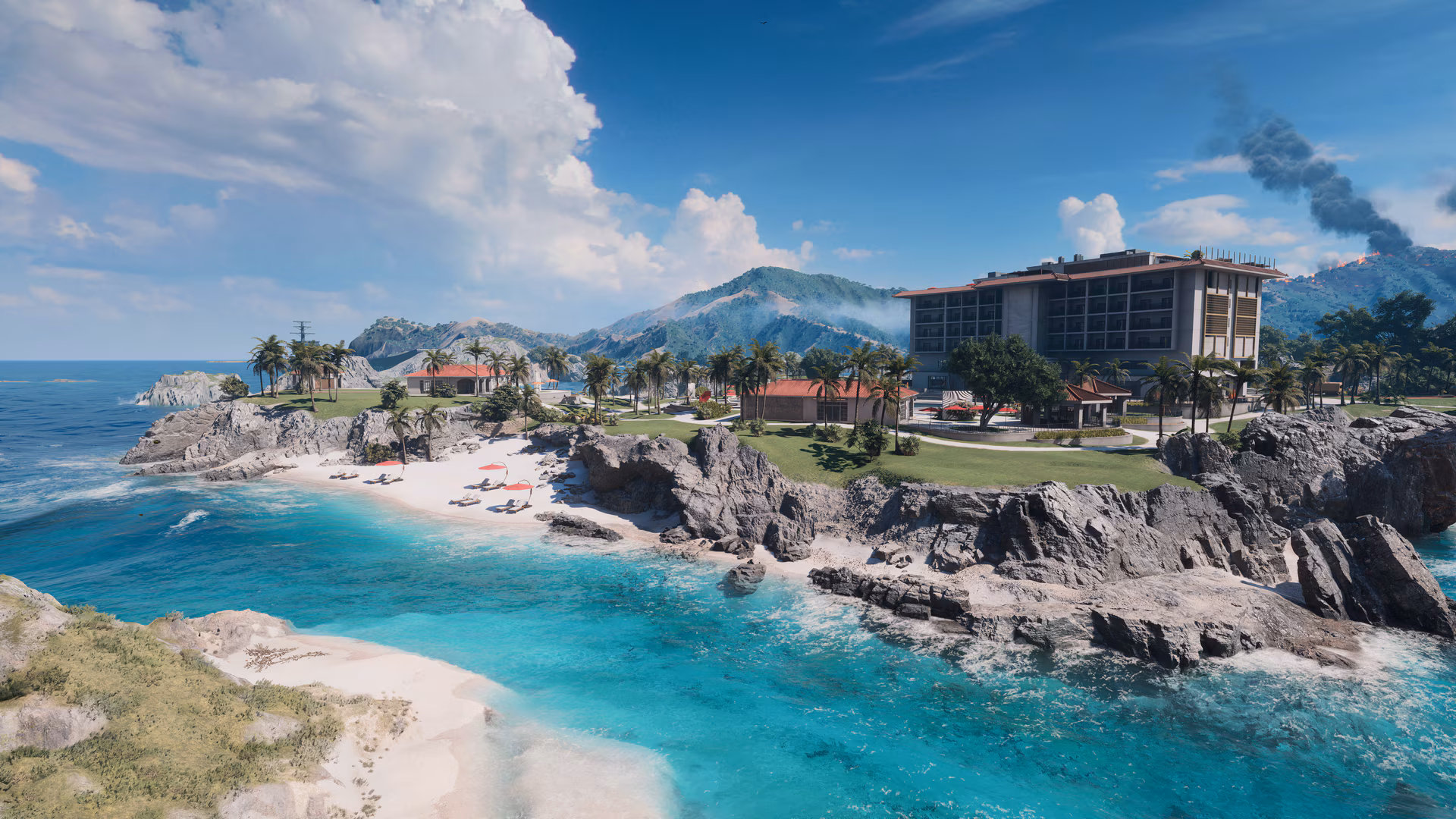 Le Complexe Ikoi majestueux vu depuis la mer, avec sa plage, ses villas et le bâtiment principal de l'hôtel