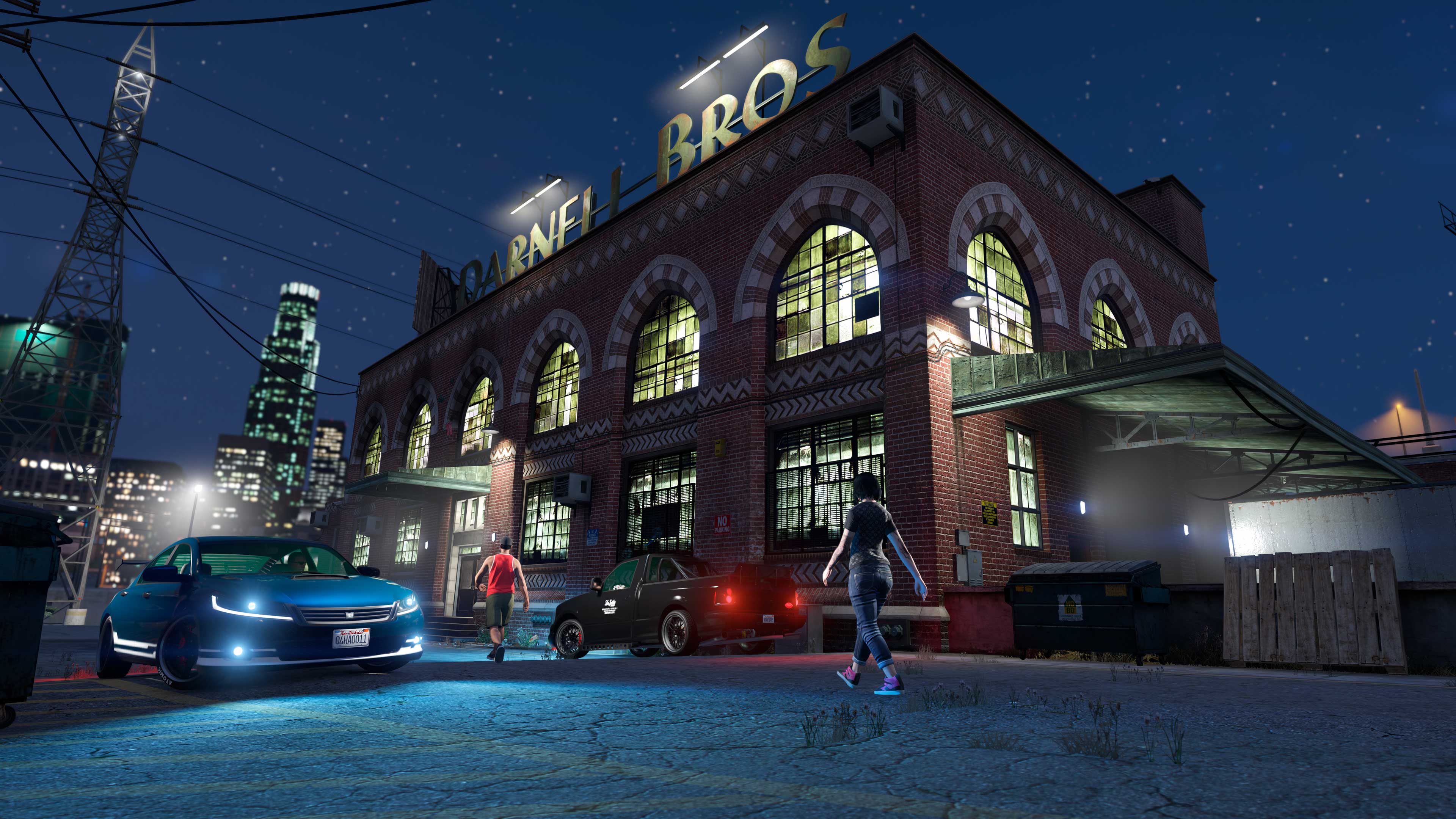 Le bâtiment de l'usine de vêtements Darnell Bros dans GTA Online, avec son enseigne et son panneau d'achat à l'avant