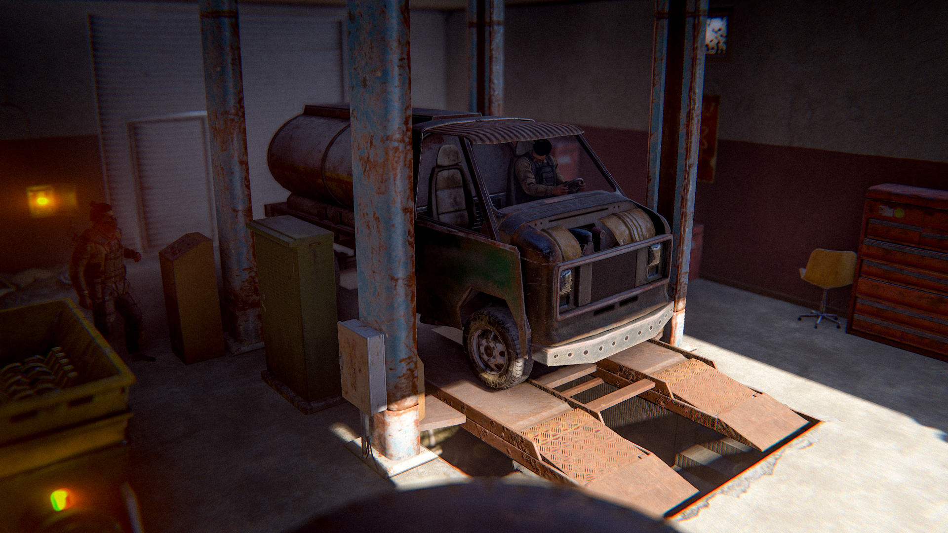 Un camion équipé du module citerne posé sur le car lift du garage d'Oxum's Gas Station dans Rust