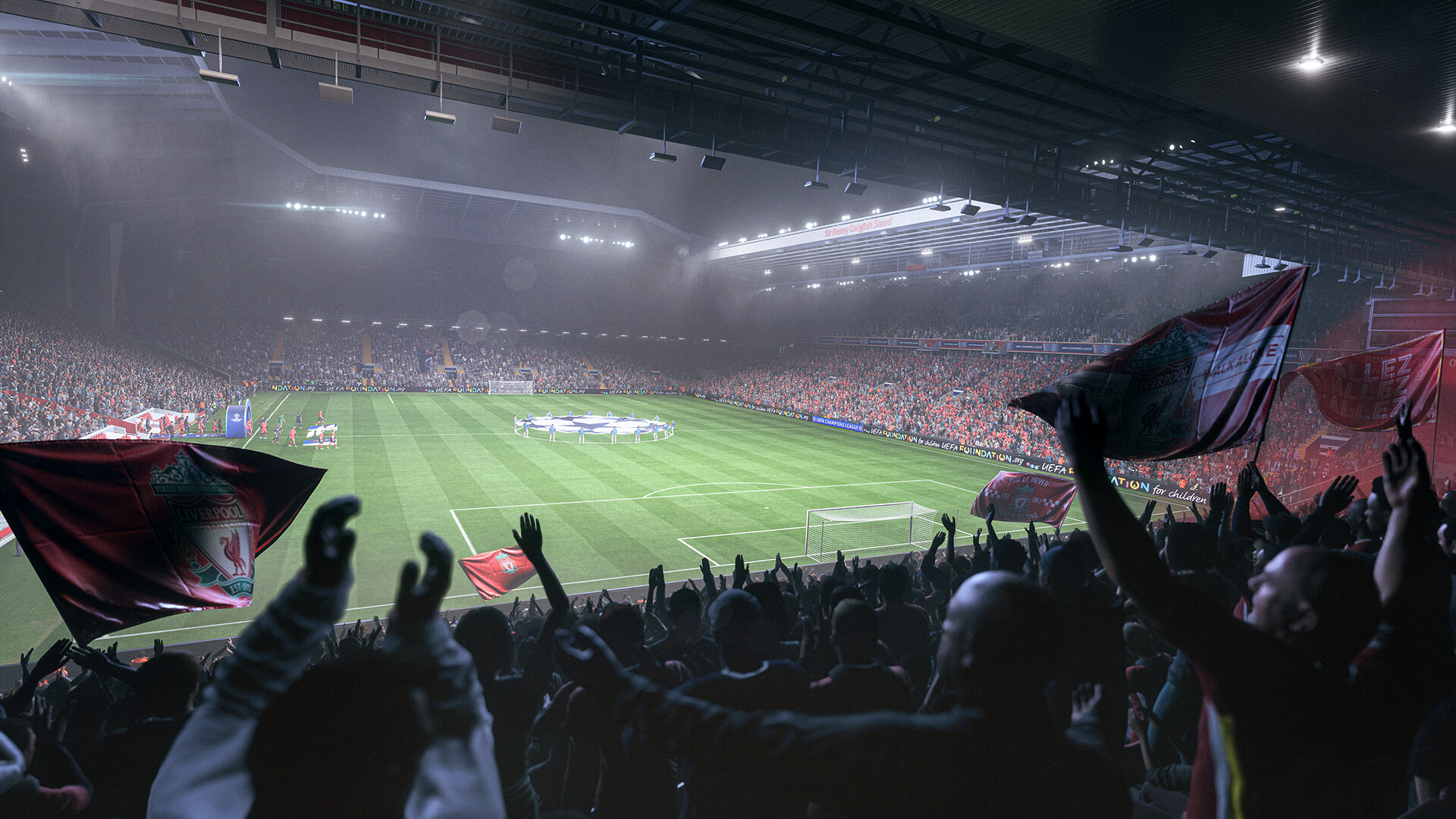 Vue depuis les tribunes d'un stade de football la nuit, drapeaux de Liverpool agités avant le coup d'envoi dans EA Sports FC 26