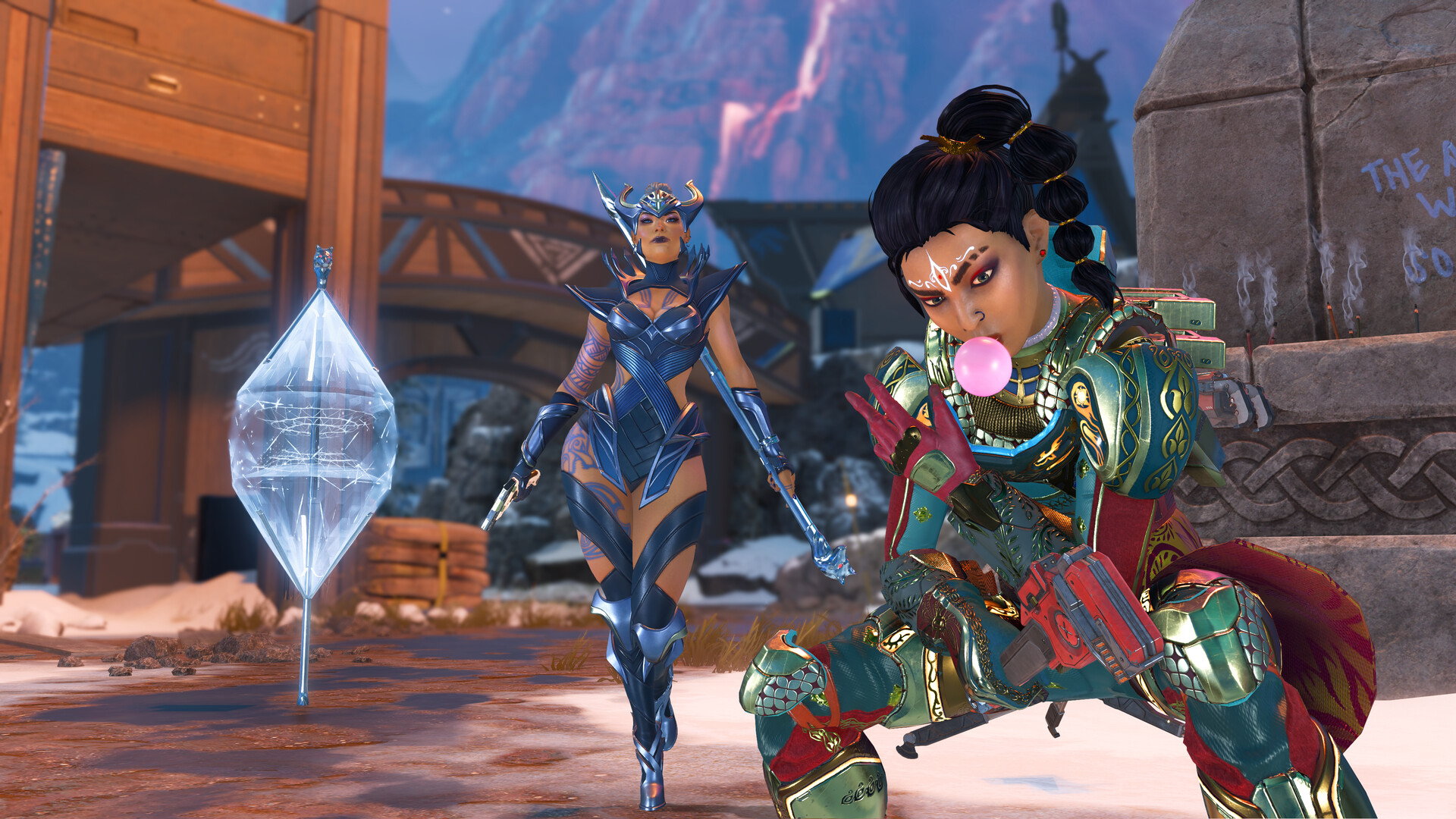 Deux Légendes d'Apex Legends armées, accroupies et en marche, dans un secteur enneigé de la carte