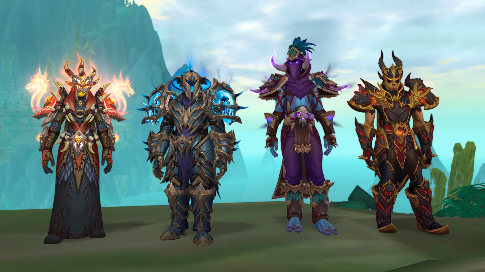 Quatre personnages de World of Warcraft portant les ensembles d'armure de classe du raid de l'abîme Venimeux