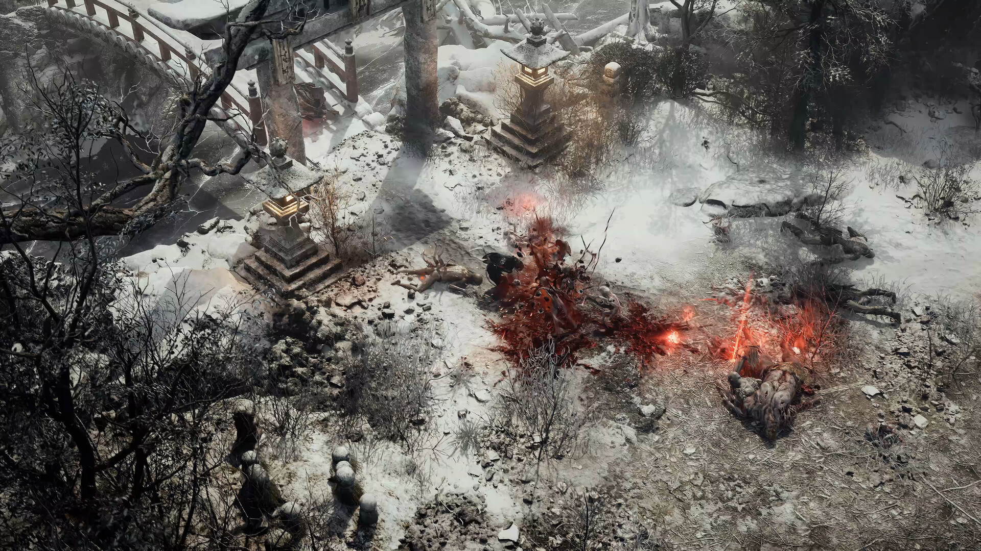Sanctuaire enneigé jonché de cadavres, lanternes de pierre et pont brisé, vus de dessus