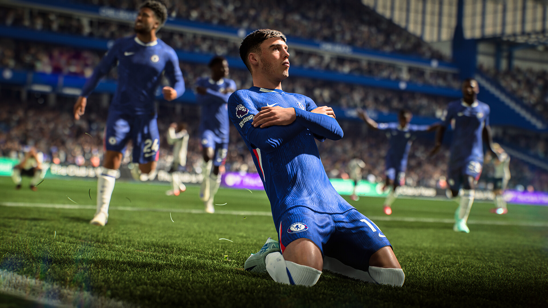 Ein Chelsea-Spieler feiert kniend ein Tor auf dem Rasen von Stamford Bridge in EA Sports FC 26