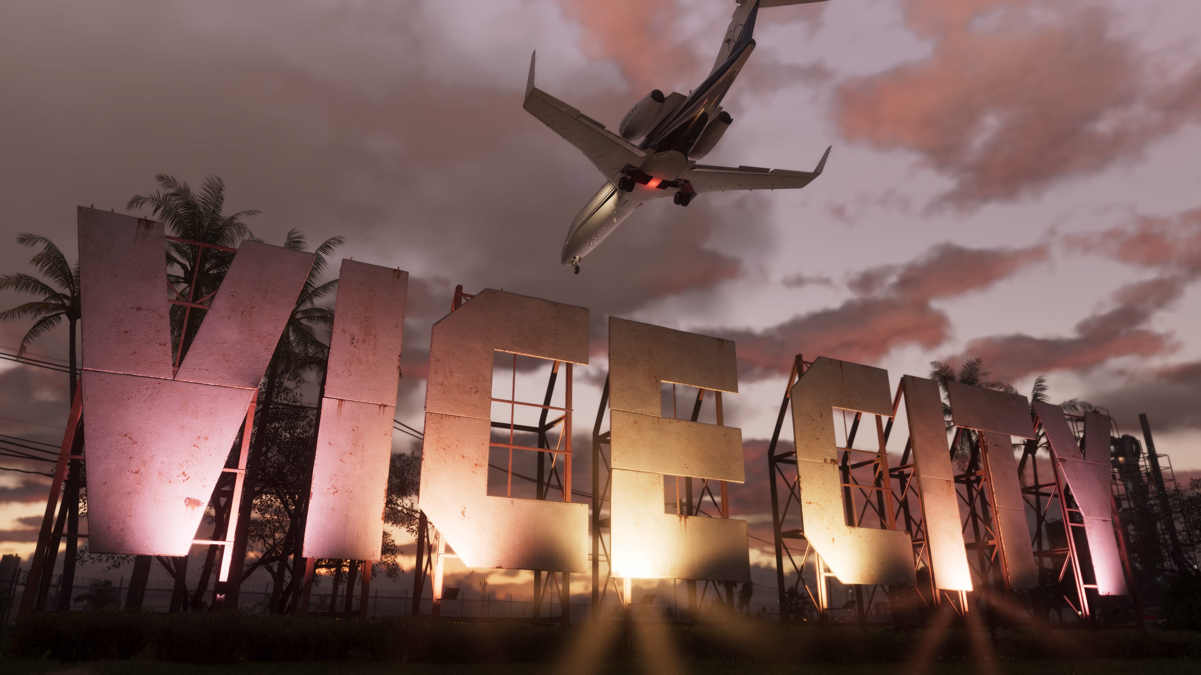L'enseigne géante et défraîchie « VICE CITY » dressée au bord d'une piste, un jet d'affaires passant juste au-dessus dans un ciel rose de fin de journée