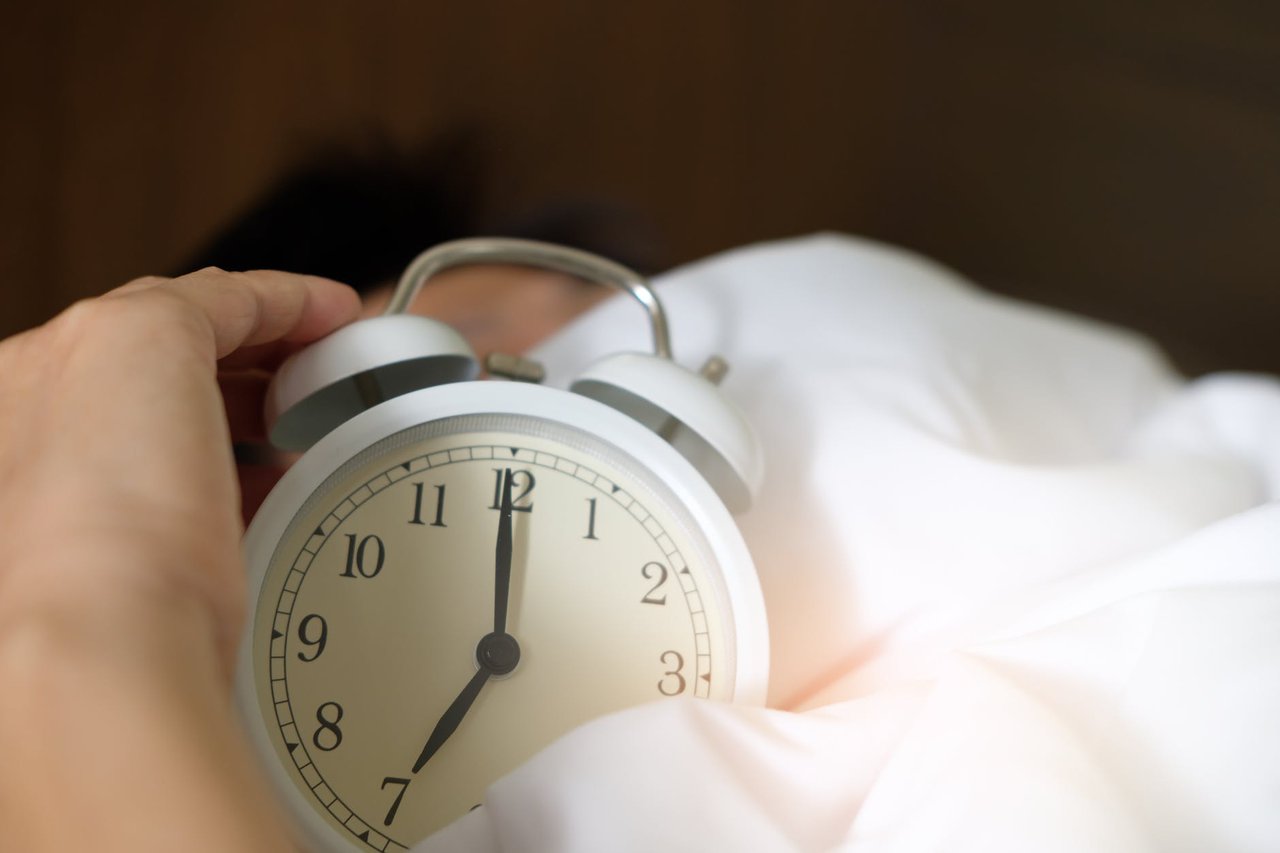 Blog - Top 10 Steps to Lift the Mood - A white sleeping alarm