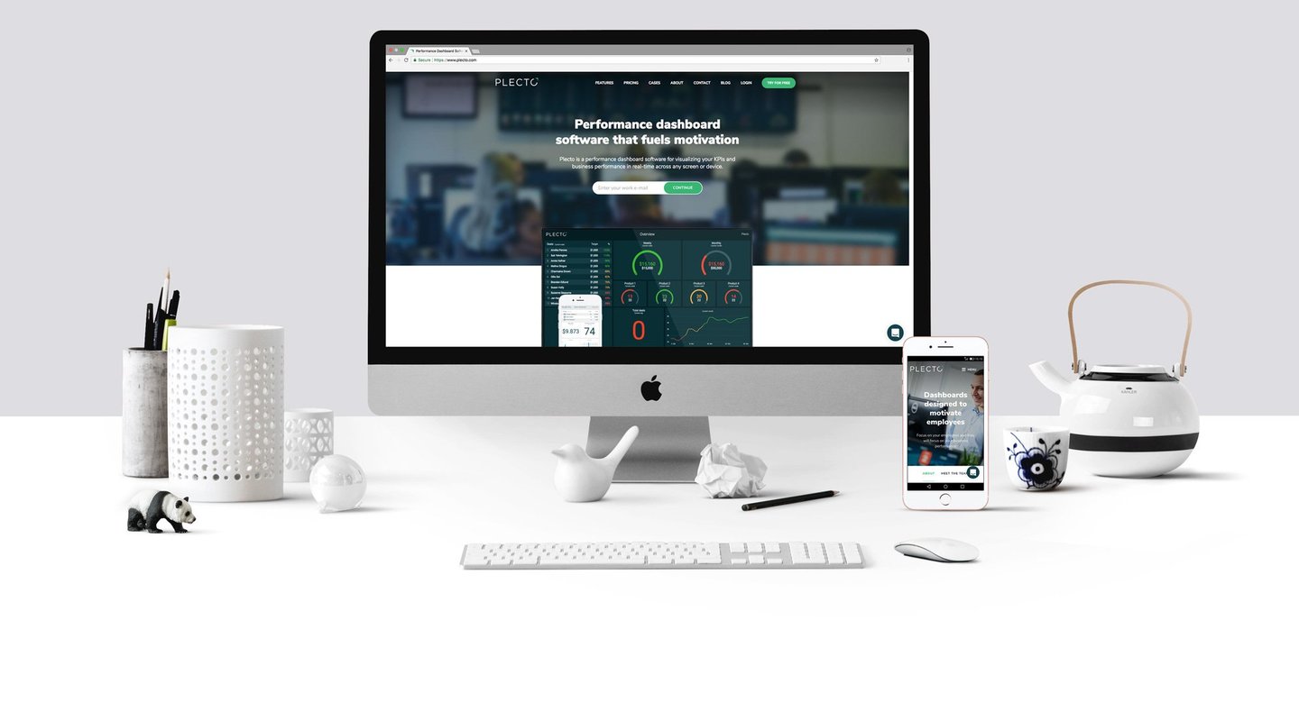 Blog - We have re-designed our website! - Office computer displaying Plecto's new website