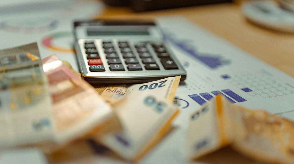 calculator and bills.png