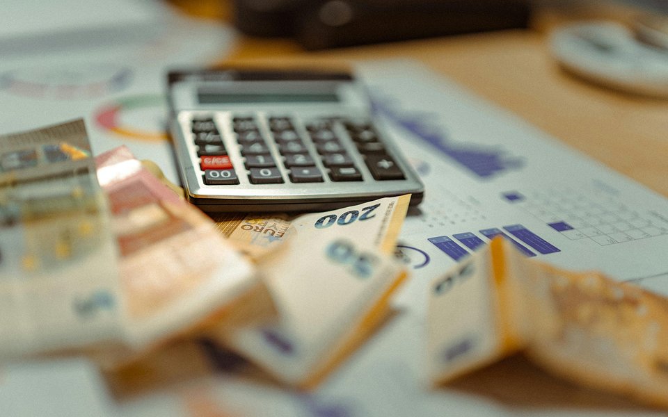 calculator and bills.png