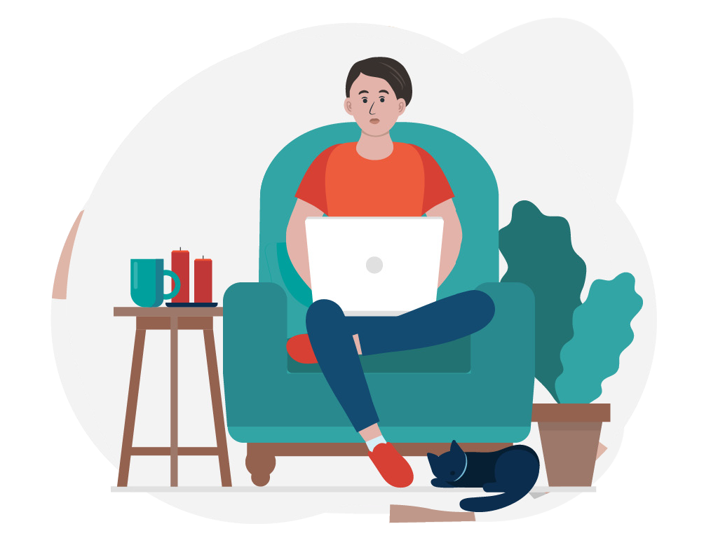 Junges sitzt mit Laptop auf Sessel