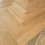 Pose collée à Bâton Rompu de Parquet Chêne Listone Giordano