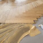 Pose collée à Bâton Rompu de Parquet Chêne Listone Giordano