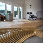 Pose collée à Bâton Rompu de Parquet Chêne Listone Giordano