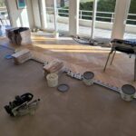Pose collée à Bâton Rompu de Parquet Chêne Listone Giordano