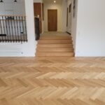 Pose collée à Bâton Rompu de Parquet Chêne Listone Giordano