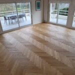 Pose collée à Bâton Rompu de Parquet Chêne Listone Giordano