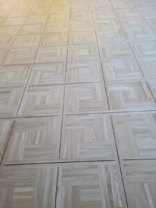 Remplacement d'un Parquet Chêne massif Cabochon suite à un dégât des eaux