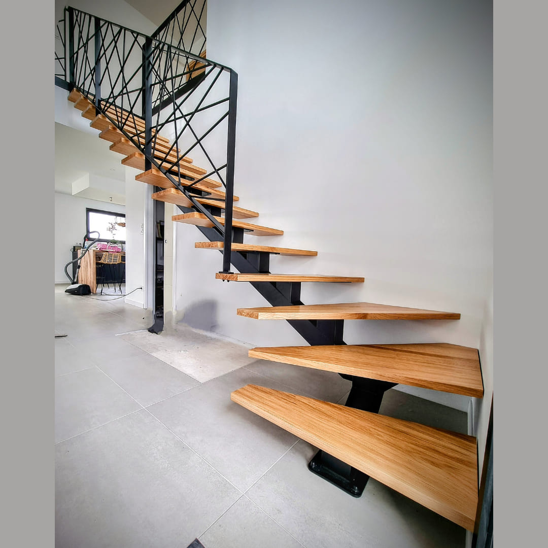 Fabrication et pose de garde-corps et de son escalier quart tournant